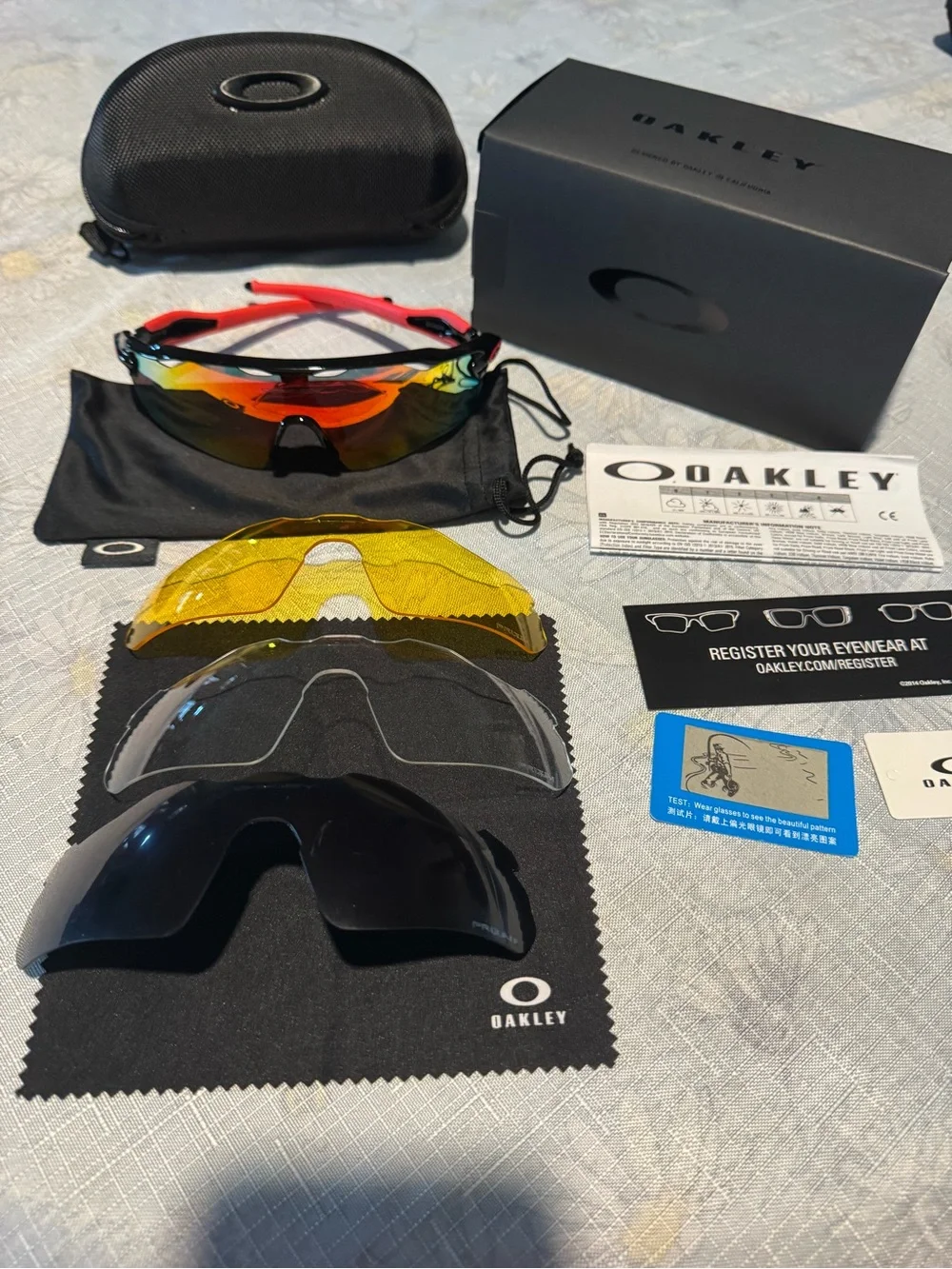 Oakley sports sunglasses — Black frame with Red temples and Yellow mirrored lens
